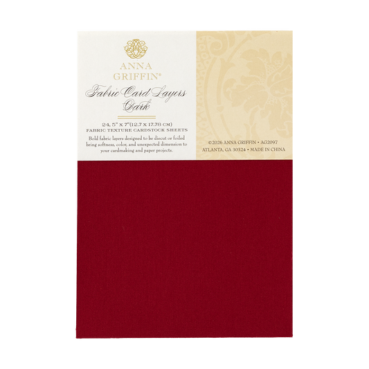 A package of Dark Fabric Card Layers in dark red for card making, with product info on the label and a 5″ x 7″ fabric sheet sample below.