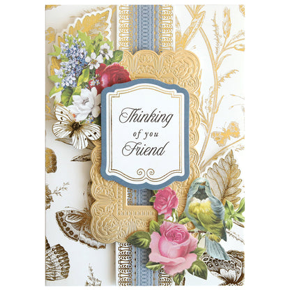 The In The Garden Ultimate Paper Crafting Kit includes a "Thinking of you Friend" greeting card with gold patterns, flowers, butterflies, and a bird—ideal for scrapbooking or cardmaking projects.