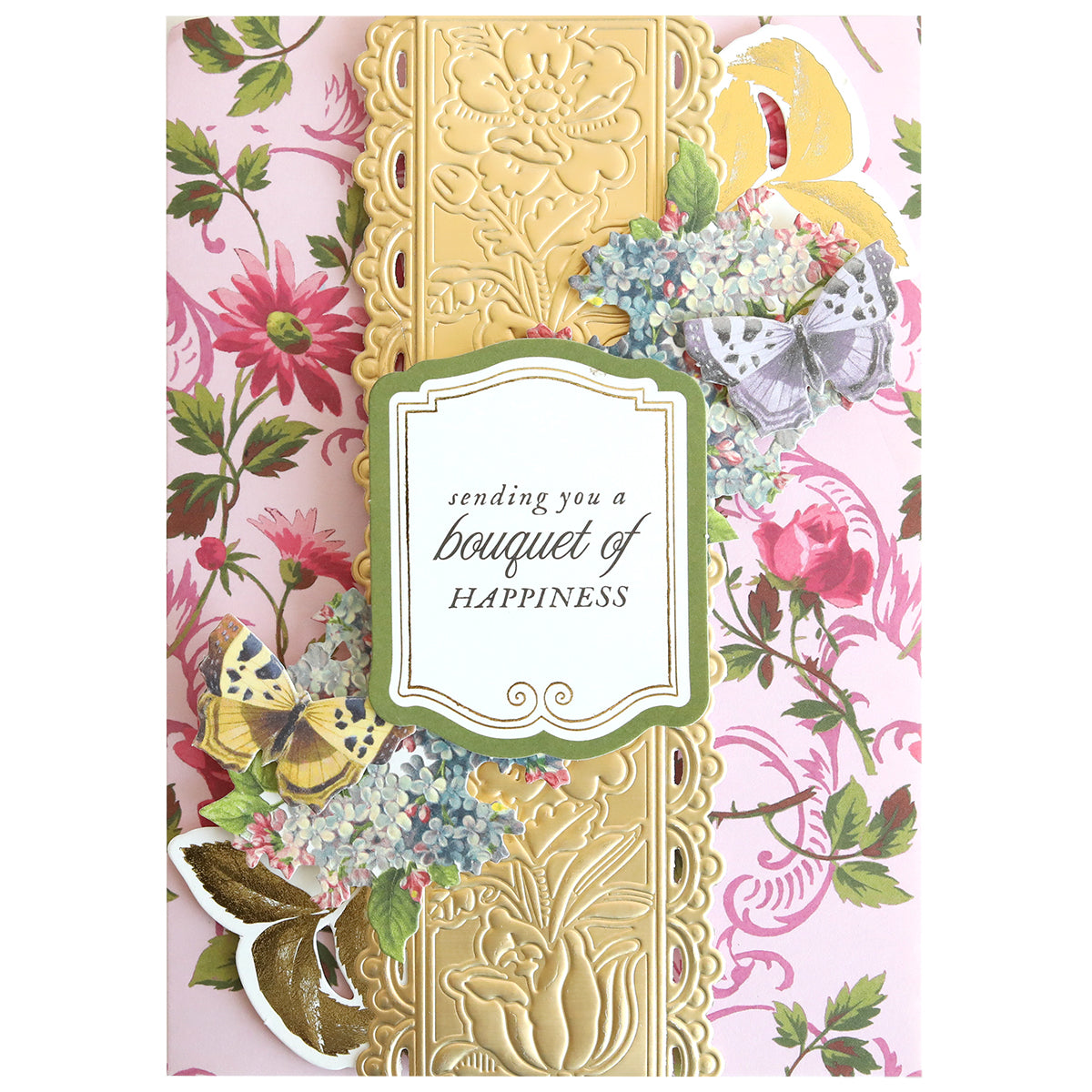 The In The Garden Ultimate Paper Crafting Kit features a floral and butterfly greeting card with a gold embossed border and "sending you a bouquet of HAPPINESS"—ideal for cardmaking or scrapbooking projects.