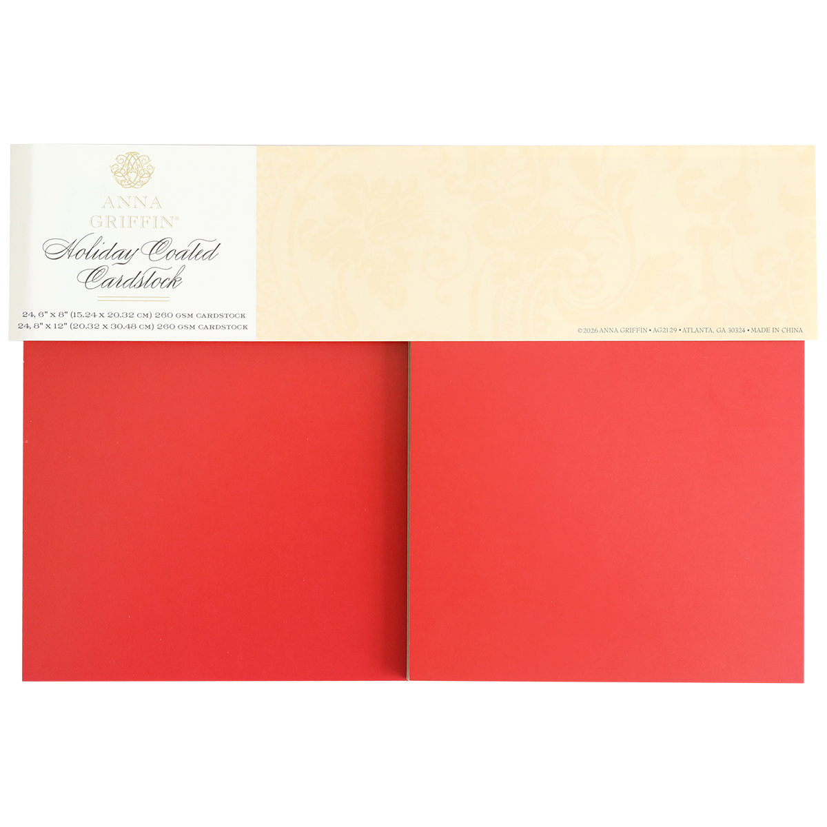 A pack of Holiday Coated Cardstock, ideal for foil holiday projects, with two large sheets of heavyweight red cardstock partially visible beneath the label.