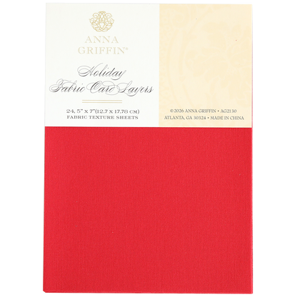 A package labeled "Holiday Fabric Card Layers" showcases a rich red fabric-texture sheet on the front, making it ideal for creating luxurious Christmas cards with elegant fabric cardstock.