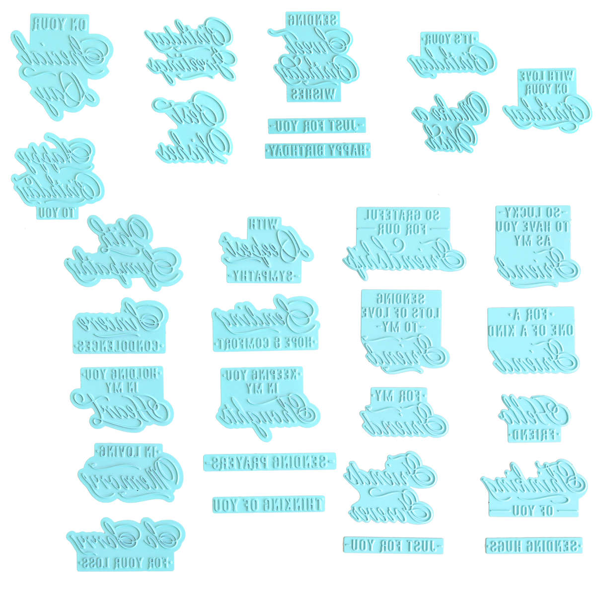 The Set of 30 Gilded Small Sentiment Plates features light blue, mirrored plastic stamps with a variety of short sympathy and birthday sentiments arranged in rows on a white surface—ideal for pairing with Small Sentiment Hot Foil Plates.