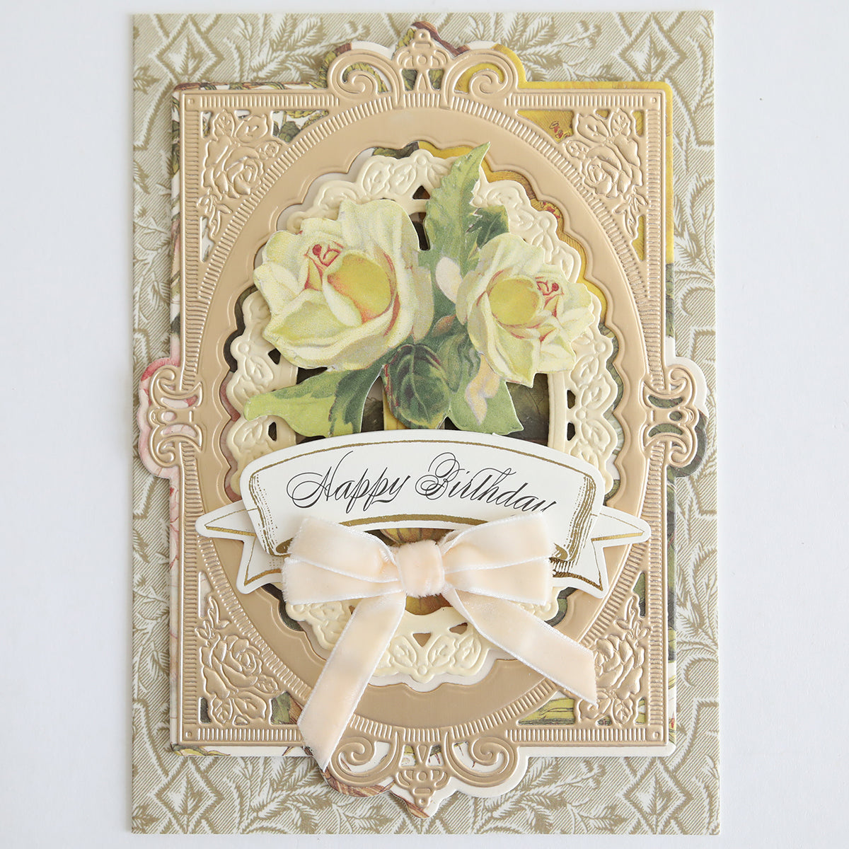Add a touch of elegance to your card making and holiday crafts with Velvet Double Bows—luxurious cream velvet bows that beautifully complement ornate designs featuring features like embossed gold borders, white rose illustrations, and "Happy Birthday" banners.