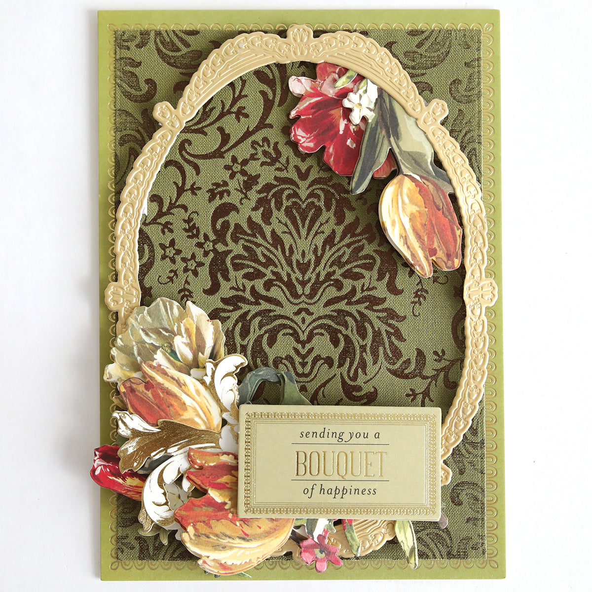 Greeting card with a gold ornate frame, floral decorations, and a label that reads “sending you a BOUQUET of happiness” on an olive green patterned background—perfect for autumn paper crafting or adding a special touch to your handmade cards.