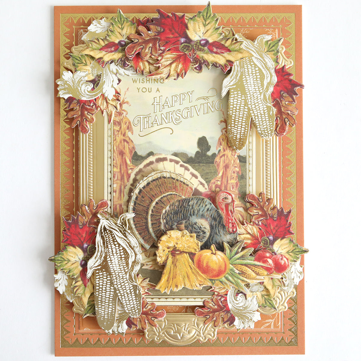 Add a touch of vintage charm to your collection with the Fall Thanksgiving Postcards and Embellishments—featuring classic imagery of a turkey, corn, pumpkins, and autumn leaves framed in gold with “Wishing You a Happy Thanksgiving” at the center. Perfect for postcard collectors or for inspiring your autumn paper crafts and fall-themed projects.