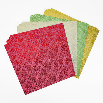 Five sheets of Holiday Glitter Foil Pattern 12x12 Cardstock in festive red, cream, green, and yellow are fanned out on a white background—perfect for Christmas paper crafts or holiday cardstock projects.