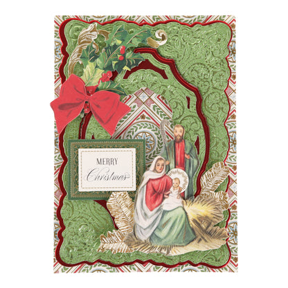 Holiday Glitter Foil Pattern 12x12 Cardstock features an ornate green and red design with holly, ribbon, “Merry Christmas” text, and an illustration of Mary, Joseph, and baby Jesus in a manger—perfect for showcasing your love of Christmas paper crafts or sending warm wishes on beautiful holiday cardstock.