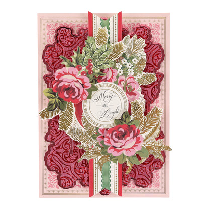 Add festive sparkle to your Christmas paper crafts with the Holiday Glitter Foil Pattern 12x12 Cardstock, featuring ornate red and pink floral designs, gold accents, and a “Merry and Bright” message at the center—crafted on glitter cardstock for an extra special touch.