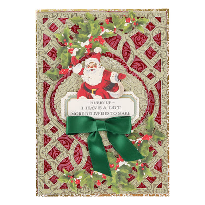 Create festive Christmas cards using Holiday Glitter Foil Pattern 12x12 Cardstock, featuring a raised Santa illustration, holly accents, a green bow, and a gold and red background. The card includes the playful message: “Hurry up - I have a lot more deliveries to make.” This charming design is ideal for lovers of Christmas paper crafts.