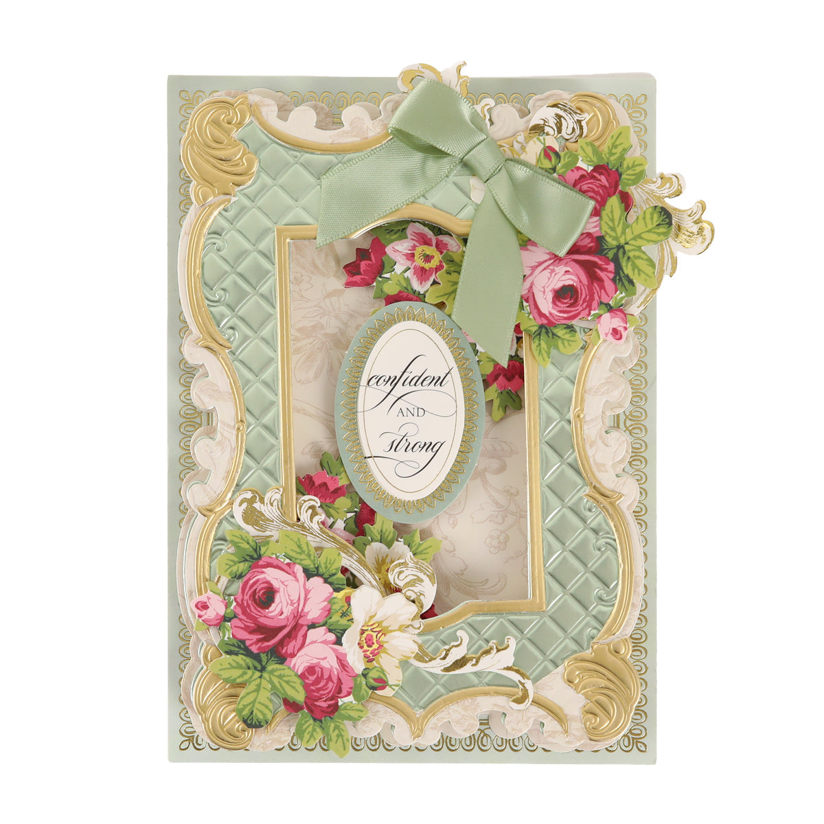 Ornate greeting card featuring a green quilted pattern, pink flowers, gold accents, and striking 3D Cottage Roses Embellishments, finished with a green ribbon bow. An oval label reading “confident AND strong” in elegant cursive sits at the center, framed by beautiful floral details for added charm.