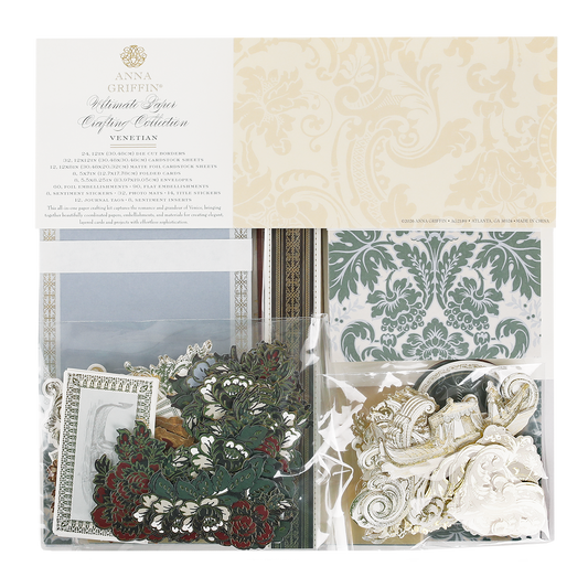 Venetian Ultimate Paper Crafting Collection includes decorative patterned cardstock and assorted floral and ornate die-cut embellishments, all in a clear plastic case.