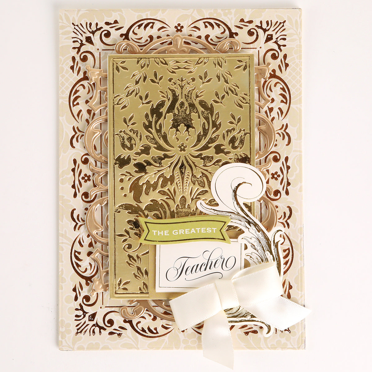 Venetian Gilded Frame Pattern Foil Plates with a damask-inspired design, gold embossed text “The Greatest Teacher,” and a white ribbon bow at the corner.