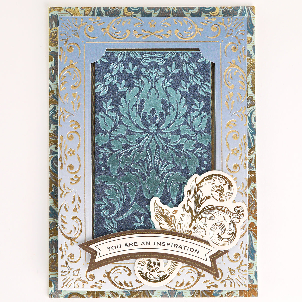 Venetian Gilded Frame Pattern Foil Plates feature ornate gold and blue floral patterns, Venetian artistry, and an inspiring cutout accent with a central banner.
