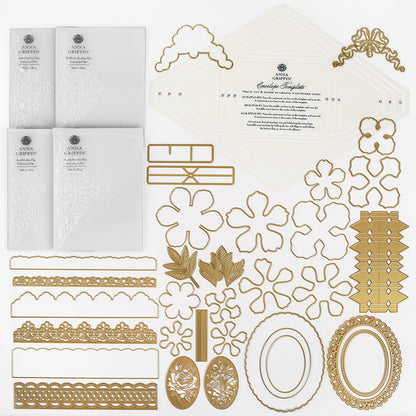 Anna Griffin | Create Fall 2026 craft kit includes four white embossed cards, gold metallic die-cut shapes—such as flowers, frames, borders, and leaves—and a decorative instruction sheet, all arranged neatly on a white background. This kit is perfect for anyone wanting to join a creative community or bring inspiration from the upcoming Create Fall 2026 craft classes into their own projects.