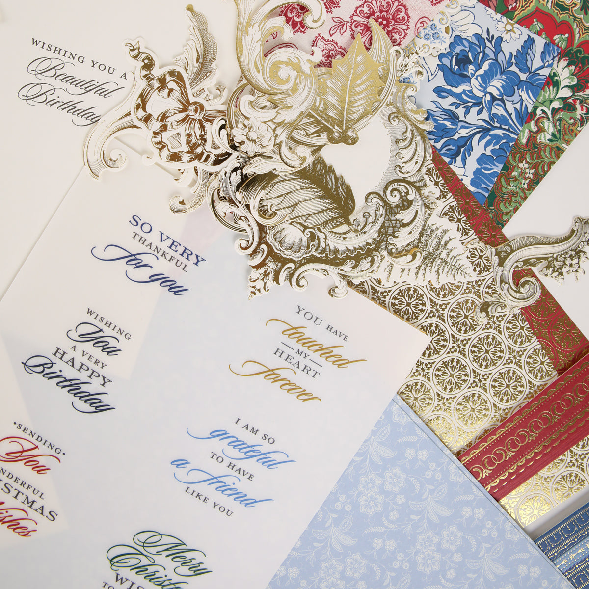 Anna Griffin | Create Fall 2026 showcases a beautiful collection of ornate greeting cards and decorative paper with intricate gold and silver designs, featuring a variety of messages like birthday and thank you wishes—ideal for inspiring craft classes or sharing within your creative community.