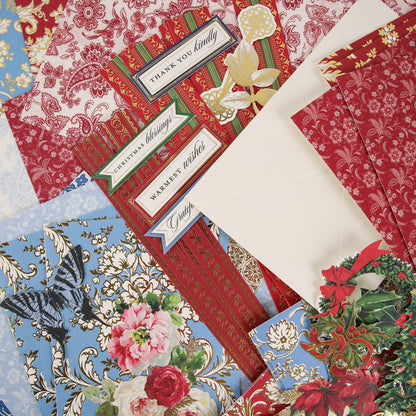 Stationery, envelopes, and paper cutouts from the Anna Griffin | Create Fall 2026 collection feature assorted patterns with phrases such as “Thank you kindly” and “Christmas blessings,” adorned in red, blue, and gold with floral, butterfly, and festive holiday designs—ideal for craft classes or sharing within your creative community as you get ready for your Fall 2026 projects.