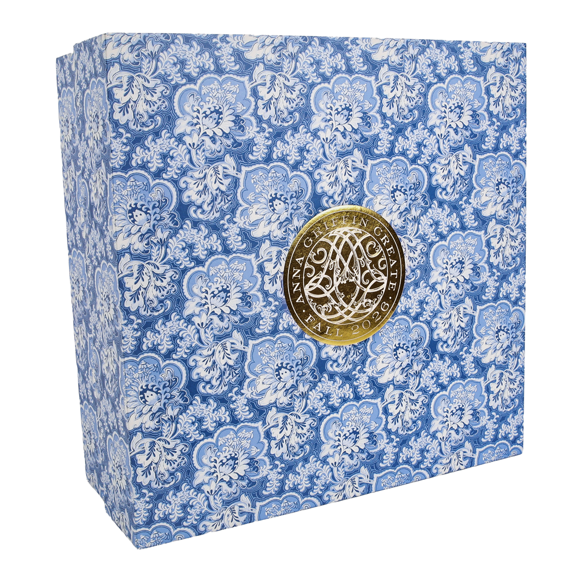Blue and white floral patterned box with a gold circular emblem in the center displaying “Anna Griffin | Create Fall 2026.” Perfect for anyone looking to join a creative community or enhance their skills through online craft classes, this elegantly designed box inspires you to create your own Fall 2026 masterpieces.