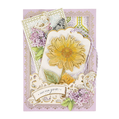 A beautifully crafted greeting card featuring a striking yellow dahlia, vibrant purple lilacs, ornate borders, and a banner that says “Just for you.” Meticulously made with the Dahlia, Mum and Sunflower 3D Floral Dies, this card displays exquisite botanical detail—ideal for paper crafts enthusiasts.