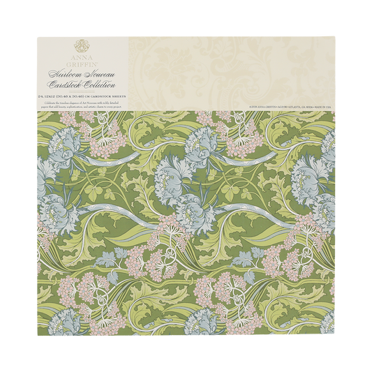 Heirloom Nouveau 12x12 Cardstock features a green, pink, and blue floral pattern from Anna Griffin’s “Collection Souvenir Caddich Collection.” This decorative scrapbook paper sheet is perfect for elegant paper crafts.
