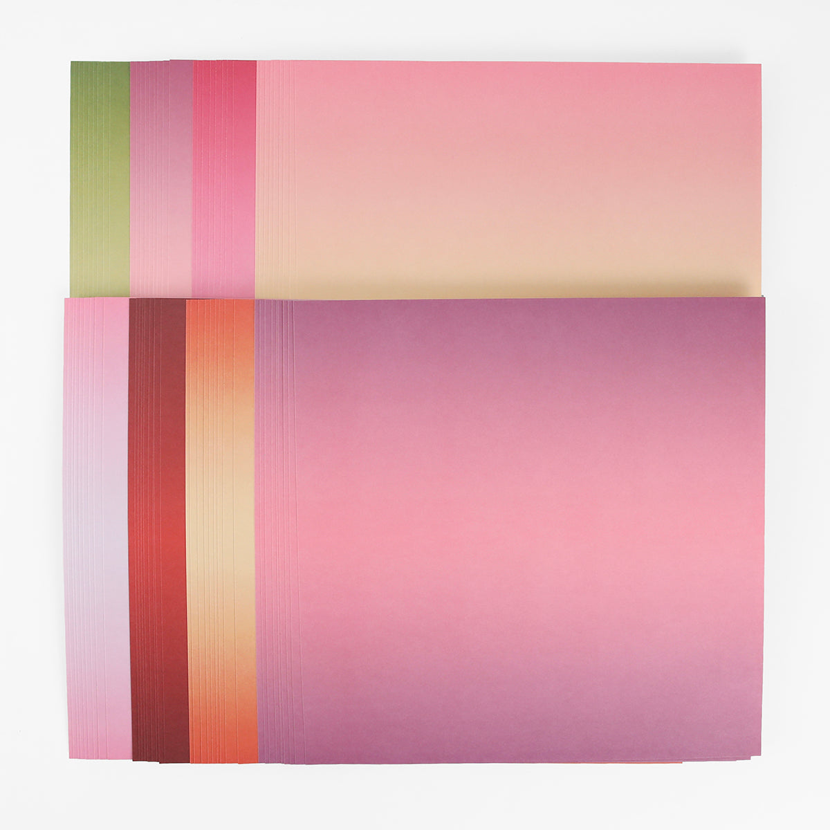A stack of Perfect Petal Double Sided 12 x 12 Cardstock in pink, red, orange, and green—ideal for card making on a white background.