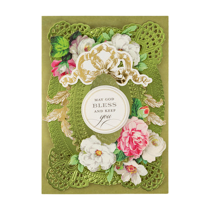 A decorative green and gold card made with Perfect Petal Double Sided 12 x 12 Cardstock, featuring floral designs and “May God bless and keep you” in the center.