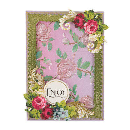 Decorative greeting card crafted with Perfect Petal Double Sided 12 x 12 Cardstock, featuring an ombré embossed pink floral pattern, green ornate border, and rose accents with “ENJOY.”.