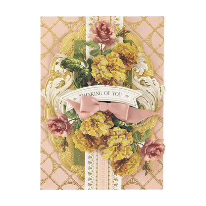 Greeting card with Fall Flower Embellishments, gold accents, a pink bow, and “Thinking of You” on a patterned pink background.