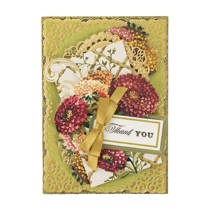 The Fall Flower Embellishments thank you card features floral designs, gold accents, intricate cut-out borders, and a 3D gold ribbon bow.
