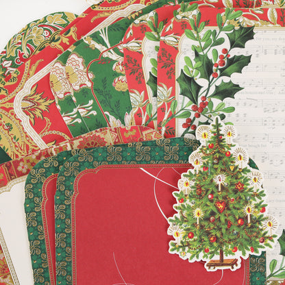 Simply Merry Christmas Card Making Kit includes holly leaf, sheet music, and Christmas tree papers—perfect for festive holiday cards.
