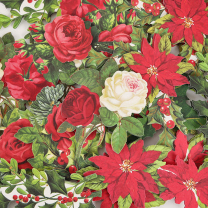 The Simply Merry Christmas Card Making Kit includes red poinsettias, red roses, a white rose, green leaves, and red berries—ideal for festive cards or holiday crafts.