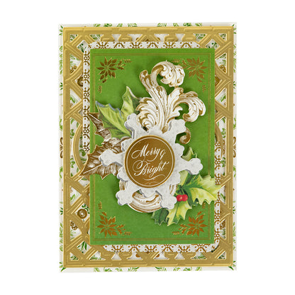 The Christmas Grace Advent Calendar features gold and green layers, holly leaves, and a “Merry & Bright” white script for festive holiday crafting.