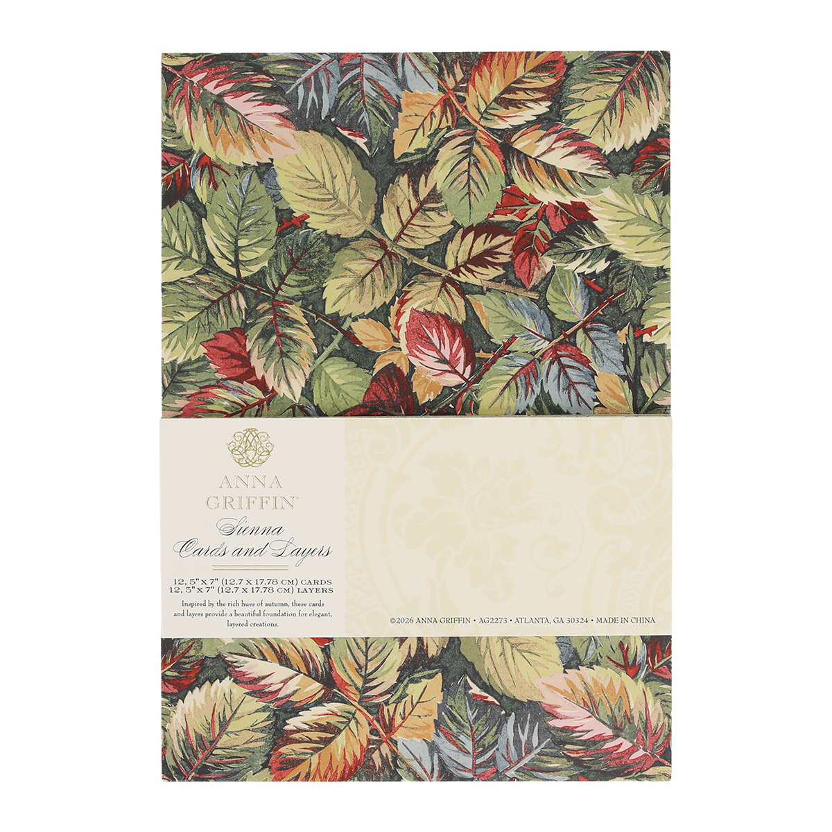 A pack of Sienna Folded Cards and Layers, ideal for cardmaking, features elegant 5″ x 7″ cards adorned with a colorful leaf pattern in green, red, and gold tones and includes product details on a cream label.