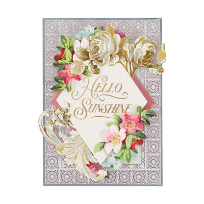 Accented with Gold Foil Flourish Stickers for an extra touch of shimmer, this decorative card features “Hello Sunshine” in gold script surrounded by gold and pastel flowers on a patterned background.