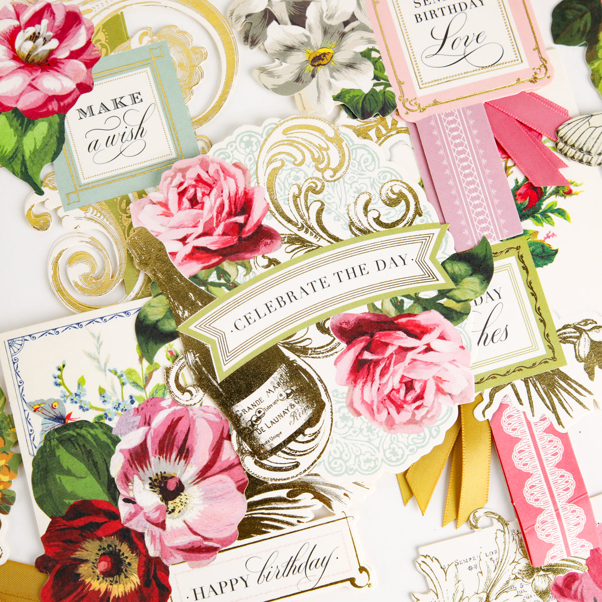 A set of Birthday Collage Card Toppers featuring elegant die-cut designs with ornate floral patterns, gold accents, and cheerful messages such as “Celebrate the day” and “Make a wish,” all displayed on a white background for a sophisticated touch.