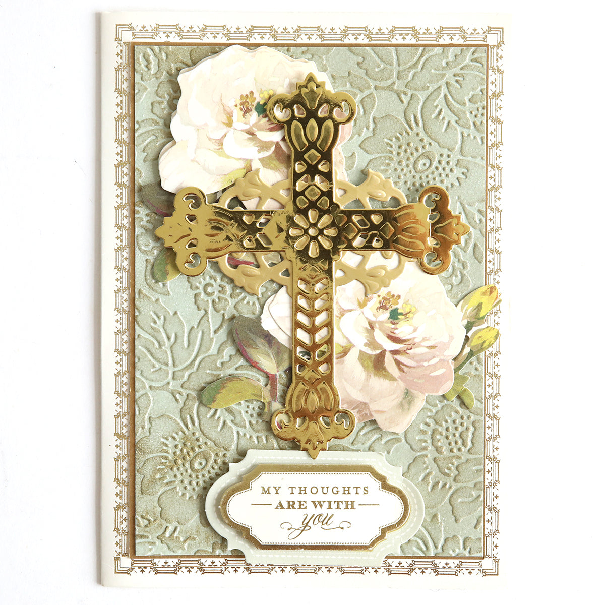 A sympathy card made from the "Shiny Foil Cardstock Bundle, Gold," featuring a gold embossed cross, white flowers, and a message that reads "My thoughts are with you" on an ornate background.