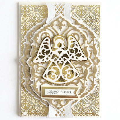 A festive card made from the Shiny Foil Cardstock Bundle, Gold showcases an ornate gold and white filigree angel design with intricate patterns, featuring the words "Joyeux Noel" at the bottom.