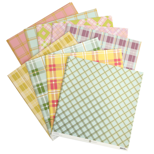 A set of Pastel Plaid 12x12 Cardstock sheets, artfully arranged with some displaying subtle gold foil accents for added elegance.