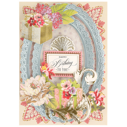 Introducing the Ice Blue Foil Cardstock Bundle: an elegant birthday card adorned with ornate floral designs, pastel blue lace patterns, gold accents, and delightful gift illustrations surrounding a central "Happy Birthday to You" message. Crafted from luxury Ice Blue Foil Cardstock and premium papercraft cardstock, this sophisticated card showcases a charming mix of shiny foil and matte finishes for an exquisite touch.