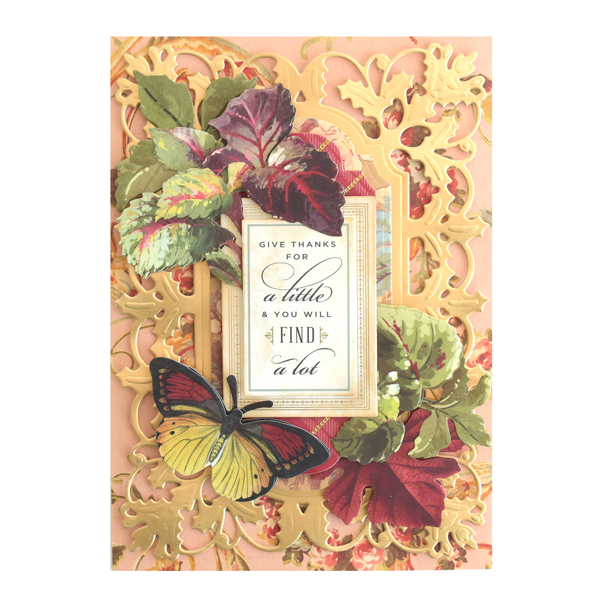 Greeting card embellished with Foliage Stickers, featuring an ornate gold design, colorful autumn leaves, and a yellow butterfly in 3D. Displays the message: “Give thanks for a little and you will find a lot.”.