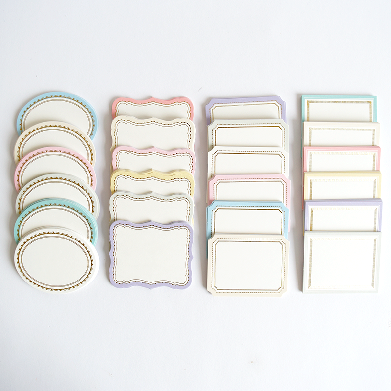 Super Sentiments and Signature Cards: a set of blank decorative paper labels in assorted pastel colors and shapes, ideal for handmade cards, neatly arranged in rows on a white background.
