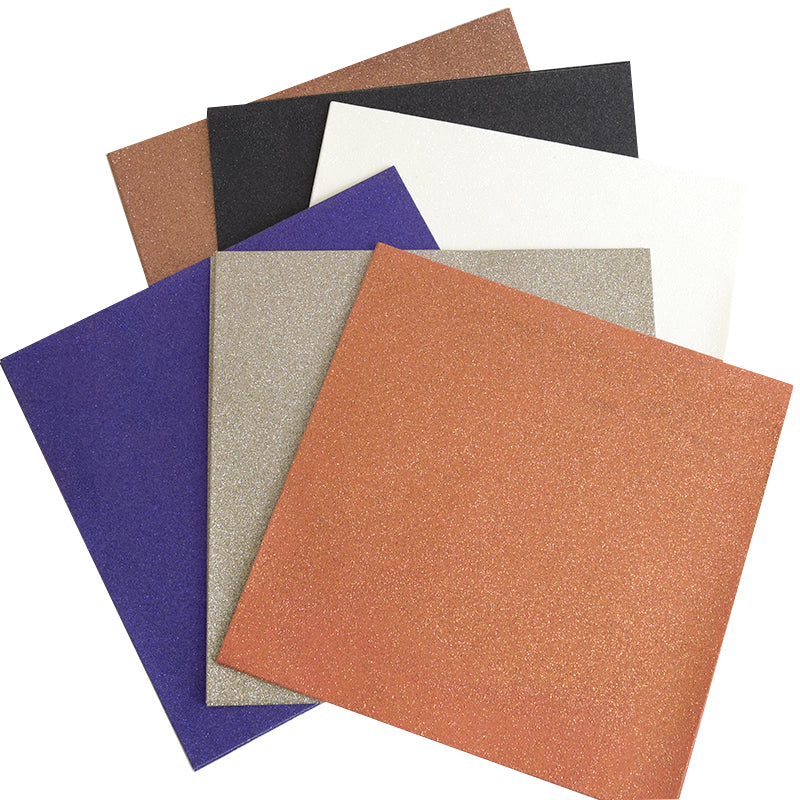 Six square sheets of glittery craft foam—in brown, black, white, purple, silver, and orange—are fanned out in a stack from the Haunted Halloween Haul set. Perfect for DIY spooky creations, these sheets pair perfectly with glitter cardstock or Halloween stickers to add extra festive flair!.