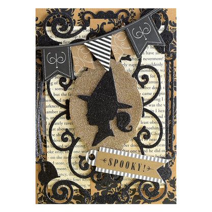 Introducing the Haunted Halloween Haul: a handmade Halloween card featuring a glittery witch silhouette crafted from premium glitter cardstock, set within an ornate black frame. The design is accented by a “SPOOKY!” banner, vintage book text background, and decorative black-and-white flags—an ideal pick for fans of unique Halloween craft supplies.