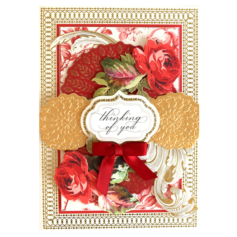 Introducing the Harvest Cut & Emboss Folders: a decorative greeting card with a "Thinking of You" message, adorned with red roses, gold accents, and a red ribbon bow. The embossed card layers add an elegant touch, making it perfect for any occasion.