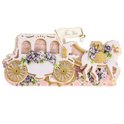 A beautiful card crafted with the Carriage Slimline Easel Card Dies, featuring a white and gold horse-drawn carriage embellished with purple and white flowers and a lovely “For You” sign—ideal for wedding cards or any special occasion.