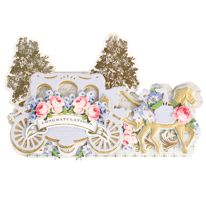 Celebrate special occasions with the Carriage Slimline Easel Card Dies—create a decorative card showcasing a gold and white carriage, pink and blue flowers, a horse, and a “Congratulations” banner, all set against gold-embossed trees. Perfect for wedding cards, these elements are expertly designed using the Carriage Slimline Easel Card Dies.