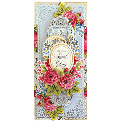 A card with a floral design on it featuring intricate cutting and multi-level embossing using the 3D Oblong Slimline Concentric Frame Dies.