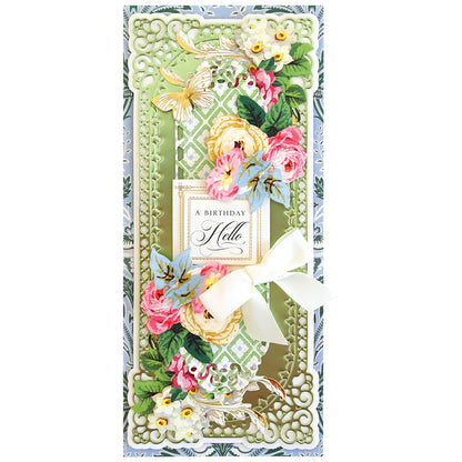 A card featuring 3D Oblong Slimline Concentric Frame Dies with flowers and ribbons, enhanced with multi-level embossing for a cutting effect.