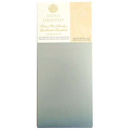 A pack of Classic Car Cardstock, featuring a light yellow and white label above a rectangular sheet of silver cardstock—perfect for crafting Classic Car Cards that will delight automobile enthusiasts.
