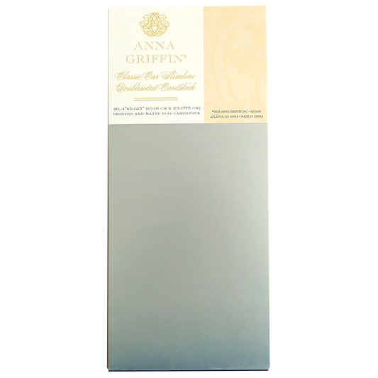A pack of Classic Car Cardstock, featuring a light yellow and white label above a rectangular sheet of silver cardstock—perfect for crafting Classic Car Cards that will delight automobile enthusiasts.