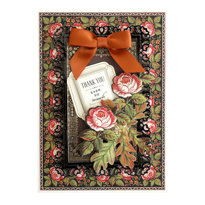 Celebrate gratitude in style with the Haunted Halloween Haul thank you card, featuring a striking red bow, ornate floral border, and beautifully layered red and white roses. The front showcases the heartfelt message “Thank You Ever So Much.” Expertly crafted on premium glitter cardstock, this elegant card pairs perfectly with Halloween stickers or other spooky craft supplies for a festive touch.